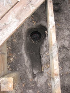 irrigation valve under wooden deck